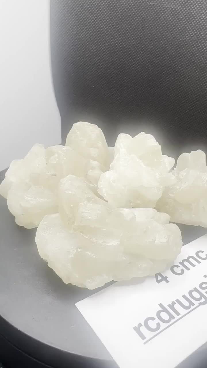 4-CMC crystals with a batch card.